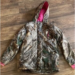 Gently used girls carhartt camo and pink coat.